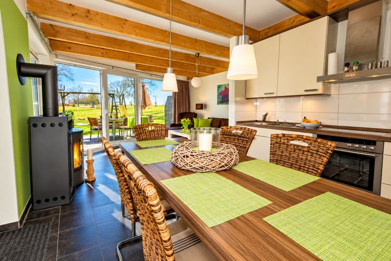 Open-plan kitchen and dining area in Benno