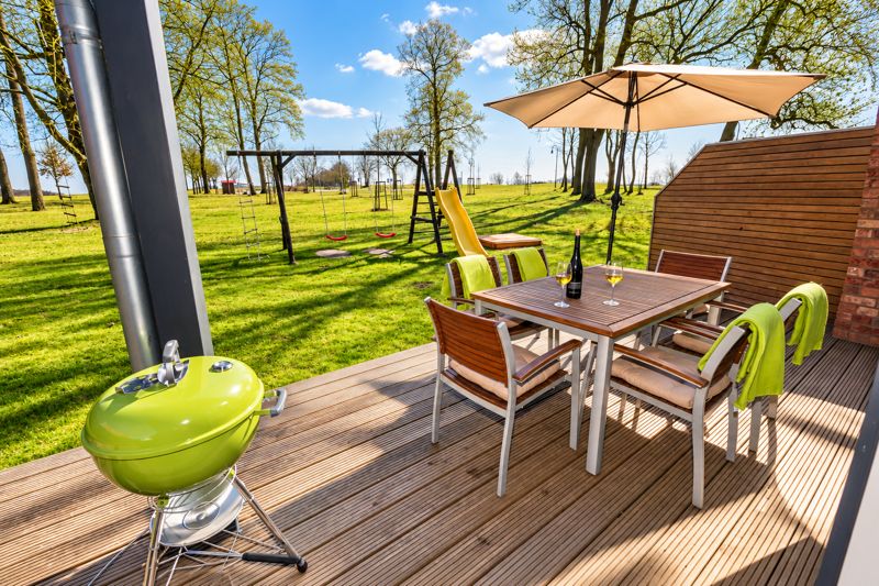 Benno's terrace with grill and outdoor seating
